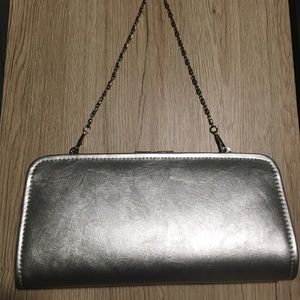 Cute and Compact Silver Clutch
